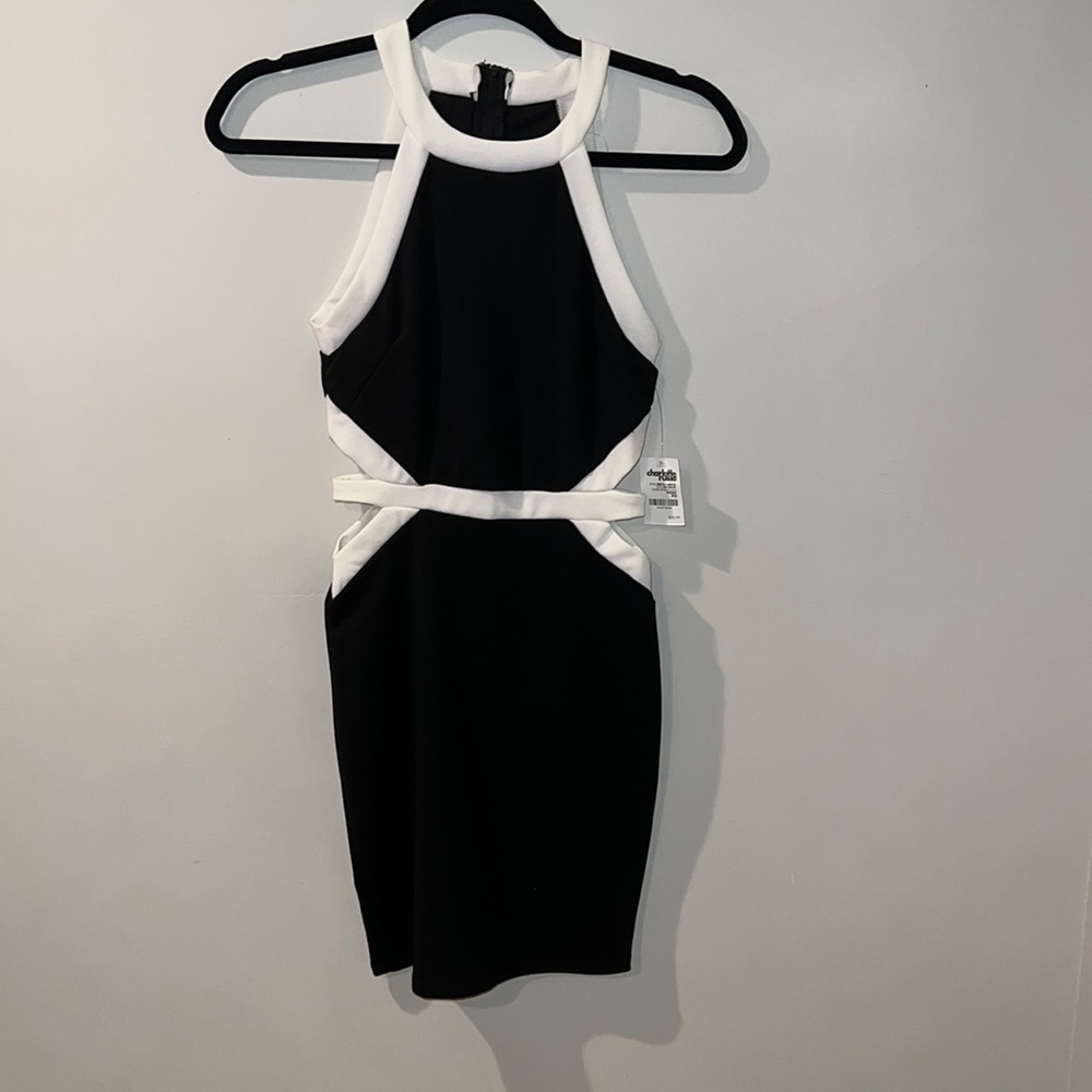 NWT form fitting black dress with side cut outs